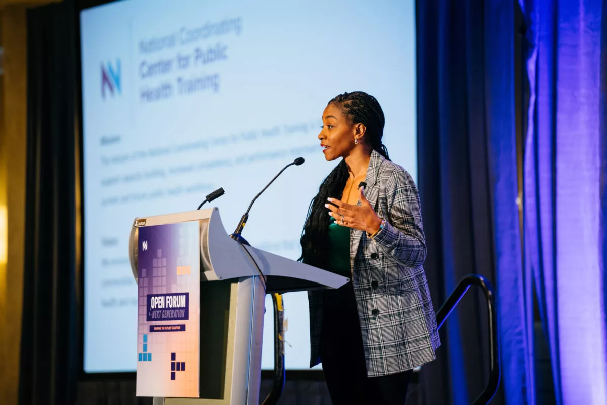 A woman presenting at a NNPHI conference