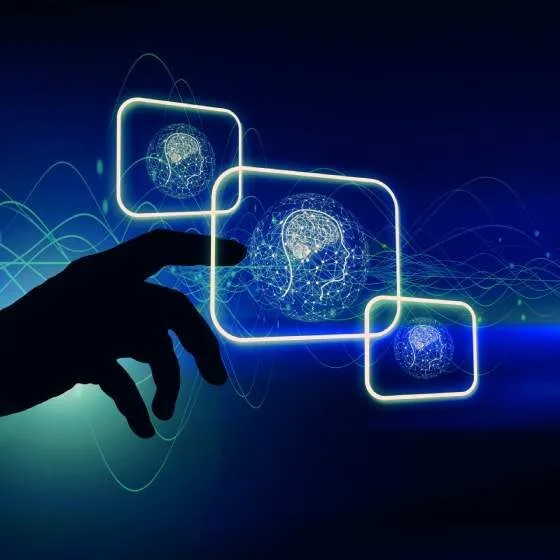 A graphic image of a hand selecting an icon on a computer screen.