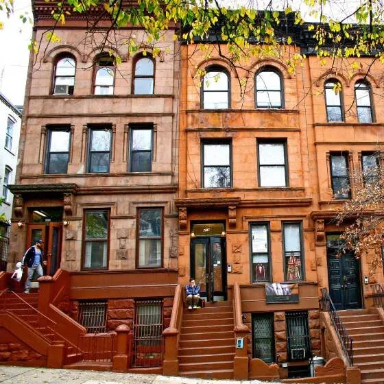 A neighborhood street in Harlem, New York City.