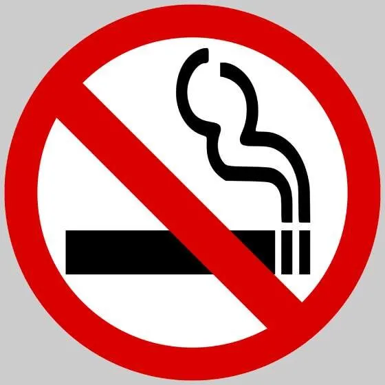 The universal no smoking symbol, with a line slashed through a cigarette.