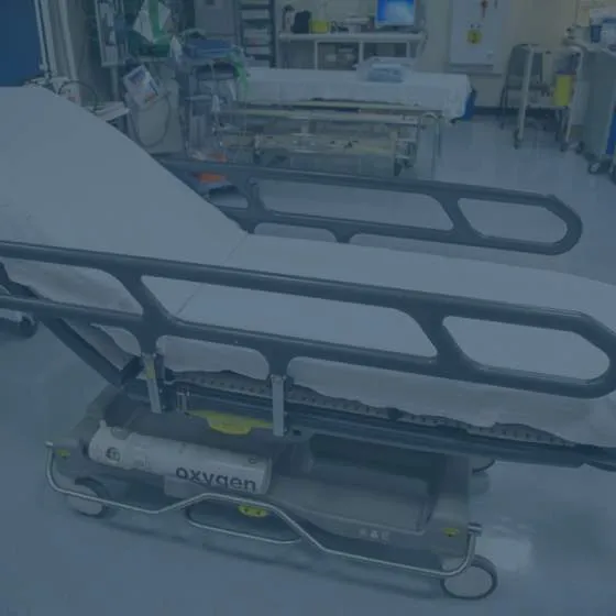 An unused hospital trolley stretcher.