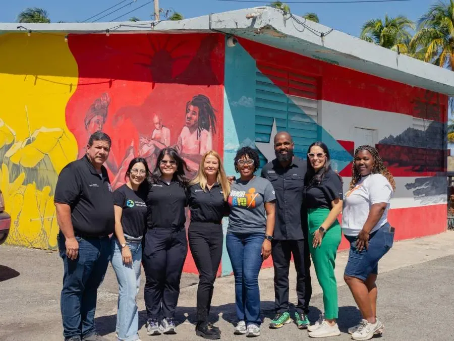 a photo of a Puerto Rico Public Health Institute and community organization project team at P.A.Y.E. In the community of Torecilla Baja in the municipality of Loiza, Puerto Rico.