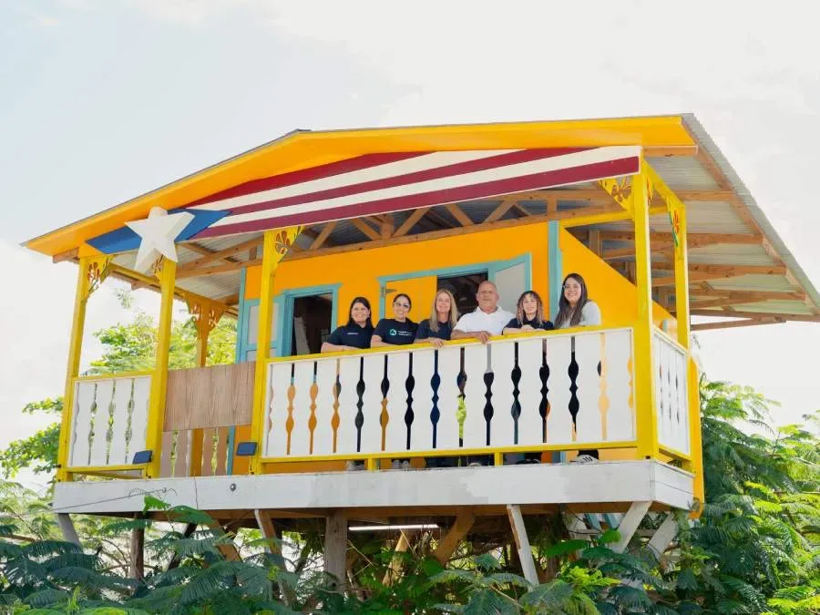 Members of the CRESe team in the community with the Pedro Calixto Community Owned Water System with Sr. Jose Oyola, the water system operator and active member of the Institute's community advisory council.
