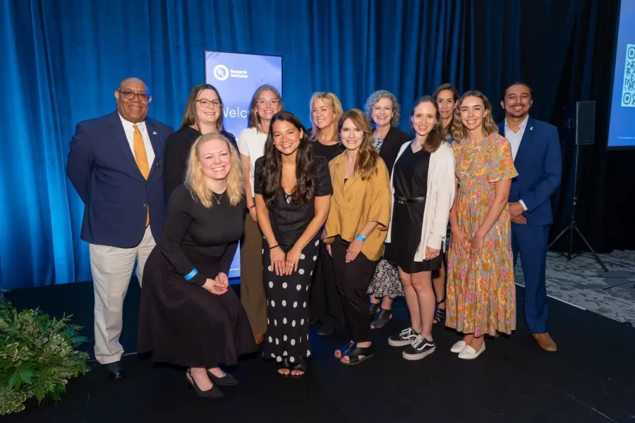 Team members gather for photo on the plenary state of the 2026 UL Research Institutes' Annual Symposium.