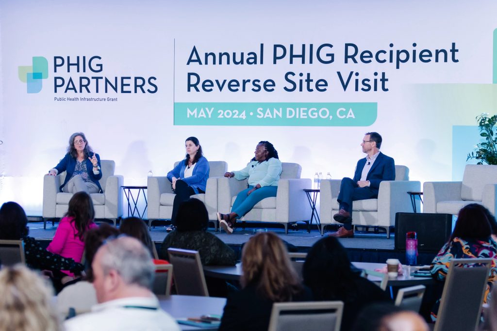 4 people participate in a panel during the PHIG Reverse Site Visit.